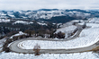 In Langhe, Piedmont, Italy, on February 3, 2026, a panorama of snow-covered vineyards appe...