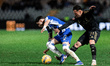 Borja Sainz of FC Porto protects the ball against Tiago Morais of Casa Pia AC during the L...