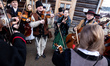Highlanders in their traditional clothes play regional music during Highlander Carnival in...