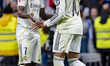 Players of Real Madrid, from left to right, Vinicius Junior and Kylian Mbappe, celebrate a...