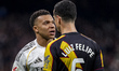 Kylian Mbappe of Real Madrid protests with Luiz Felipe of Rayo Vallecano during the LaLiga...
