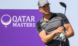 Niklas Norgaard of Denmark tees off on the 6th hole during round one of the Qatar Masters...