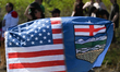 EDMONTON, CANADA - MAY 3: A participant holds a fabricated U.S./Alberta joined flag as Al...