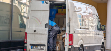 Gallery cover photo: Hermes German Parcel Service Courier Loading Parcels In Munich