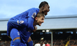 Kiernan Dewsbury-Hall of Everton is hugged by Tyrique George of Everton after his side sco...