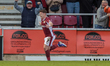 Sam Hoskins celebrates after scoring for Northampton Town, extending their lead to 3-1 aga...
