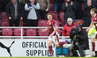 Sam Hoskins celebrates after scoring for Northampton Town, extending their lead to 3-1 aga...