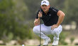 Matt Wallace of England lines up on the 5th green during the third round of the Qatar Mast...