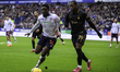 Jordi Osei-Tutu of Bolton Wanderers is under pressure from Reyes Cleary of Barnsley FC dur...