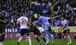 Owen Goodman of Barnsley FC fumbles his save during the Sky Bet League 1 match between Bol...