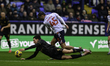Mael de Gevigney of Barnsley FC collides with John McAtee of Bolton Wanderers during the S...