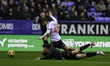 Mael de Gevigney of Barnsley FC collides with John McAtee of Bolton Wanderers during the S...