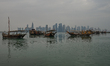 DOHA, QATAR – FEBRUARY 7: A rraditional dhow boat is docked at the Corniche waterfront du...