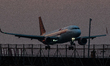 A plane lands at I Gusti Ngurah Rai International Airport in Badung Regency, Bali Island,...