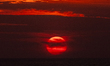 The sunset atmosphere is around Kelan Beach in Badung Regency, Bali Island, Indonesia, on...