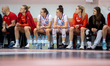 Zuzanna Krupa, Agata Gilmajster, Julia Niemojewska, and Maja Cykowska sit on the bench dur...