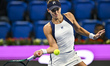 Jaqueline Cristian of Romania competes in her round of 64 match against Karolina Muchova o...