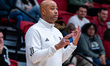 Kevin Baggett, the head coach of the Rider Broncs, motions during an NCAA men's basketball...