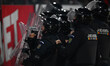 Police prepare for a clash with fans during the Liga 1 football game between CFR Cluj and...