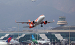 An easyJet (Basel-Mulhouse Sticker) Airbus A320-251N takes off from Barcelona-El Prat Airp...