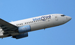 A Bluebird Airways Boeing 737-85F takes off from Barcelona-El Prat Airport in Barcelona, S...
