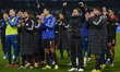 Players of Como 1907 applaud fans at the end of the Coppa Italia match between SSC Napoli...