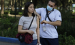 Medical personnel in Mexico City, Mexico, on February 11, 2026, administer measles vaccine...