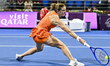 Maria Sakkari of Greece competes in her quarterfinal match against Iga Swiatek of Poland d...