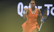 DOHA, QATAR – FEBRUARY 12: Maria Sakkari of Greece competes against Iga Swiatek of Poland...