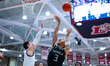 Jordan Stiemke (3) of the Loyola-Maryland Greyhounds attempts a layup during an NCAA men's...