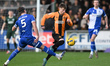 Benjamin Knight of Cambridge United challenges Alfie Kilgour of Bristol Rovers during the...