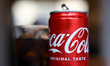 A glass of Coca-Cola with ice and Coca-Cola can are seen in this illustration photo taken...