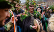 Men and women wear costumes during the festival in Satriano di Lucania, Italy, on February...