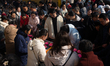 Thousands of people arrive at Jiming Temple during the first day of the Chinese Lunar New...