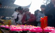 Thousands of people arrive at Jiming Temple during the first day of the Chinese Lunar New...