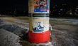 A poster with an image of President Karol Nawrocki is seen on an advertising silo in Warsa...