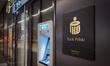 A PKO Bank Polski branch entrance shows the bank's signage and an ATM in Gdansk, Poland, o...