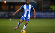 Vincent Young of Colchester United passes the ball during the Sky Bet League 2 match betwe...