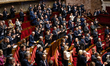 MP deputies of the Rassemblement National group, RN, applaud the intervention of the Frenc...