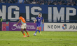 Andrew Jung (right) dribbles the ball during the Persib Bandung vs Ratchaburi match in the...