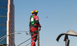 A rescuer takes part in the national earthquake drill for a hypothetical 7.2 magnitude ear...