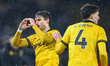 Hugo Bueno of Wolverhampton Wanderers is congratulated for the goal as he gestures to the...