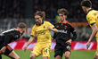 The contrast between Luka Modric of AC Milan and Nicolas Paz of Como 1907 occurs during th...