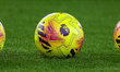 A general view shows a trio of match balls ready for use during the Premier League match b...