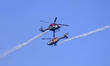 The Indian Air Force's (IAF) Sarang helicopters display team performs maneuvers over the J...