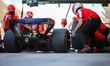 Mechanics of Scuderia Ferrari work during the Formula 1 Aramco Pre-Season Testing 2 in Sak...