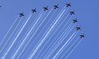 The Indian Air Force's (IAF) Surya Kiran Aerobatic Team (SKAT) performs maneuvers over the...
