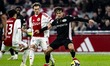 AFC Ajax Amsterdam forward Mika Godts and NEC midfielder Kodai Sano play during the match...