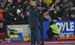 Nuno Espirito Santo, manager of West Ham United, and Paco Jerez, assistant manager, talk t...