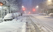 The snow covers trees and cars on E. 56th Street on Sutton Place in New York, United State...
